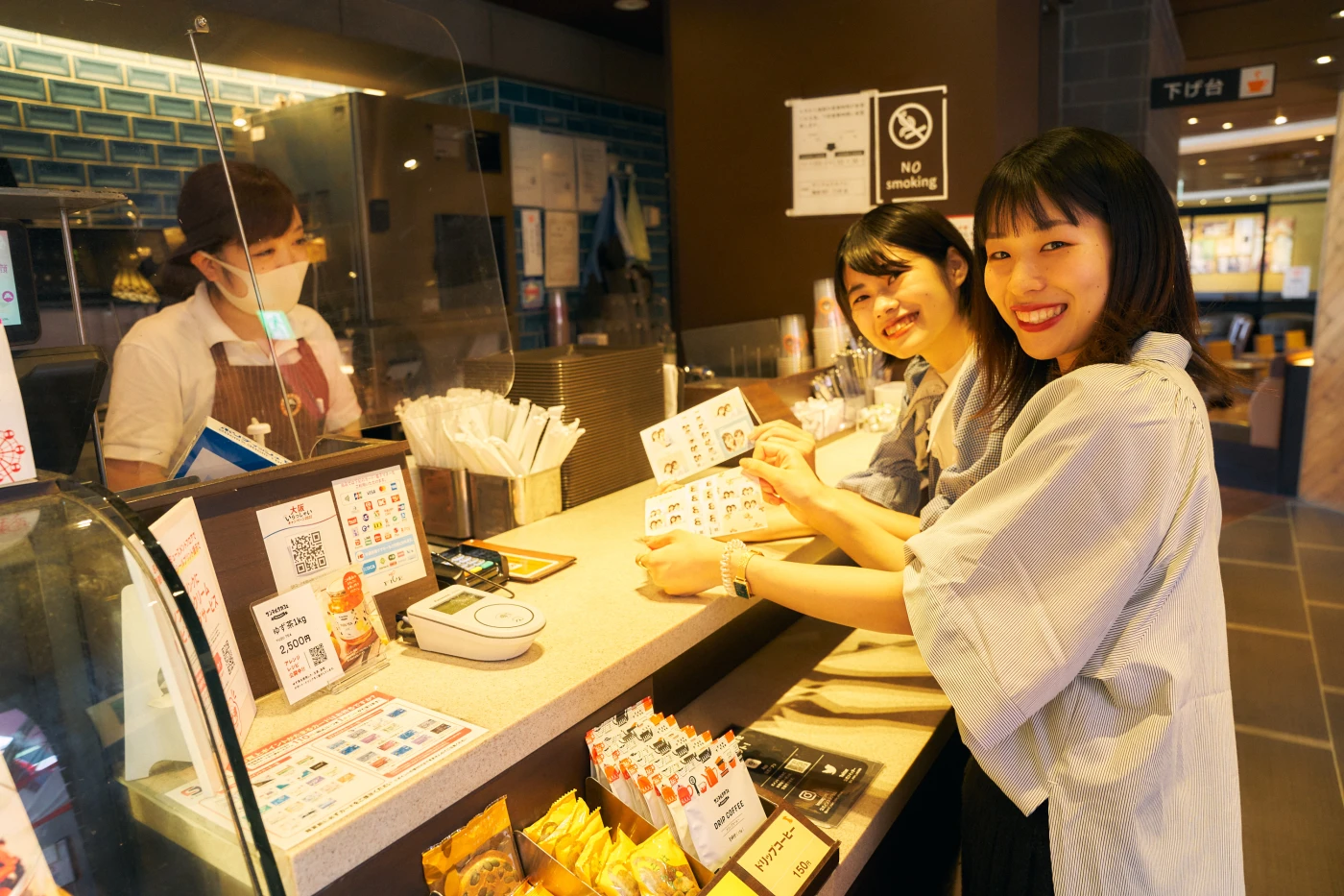 サンマルクカフェでプリクラを提示する様子